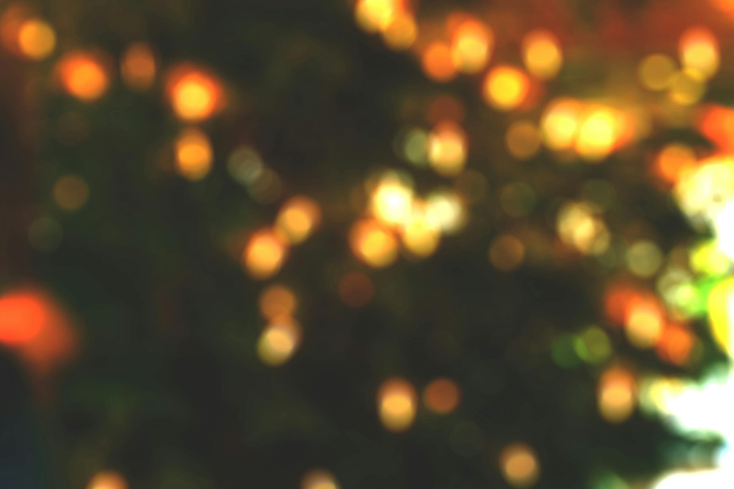 Blurred festive bokeh lights creating a warm and cozy holiday atmosphere.